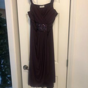 Dressy plum colored dress with decorative stones. Size 16